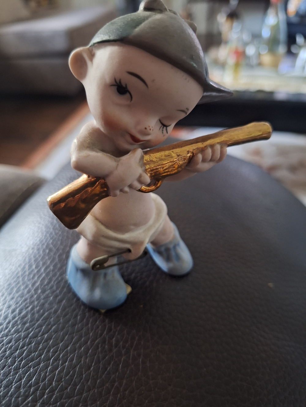 Source Unknown Porcelain Boy Figurine with Gold Rifle and Blue Shoes
